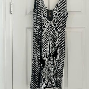 New. Never worn. Sequin sexy mini dress. Glittery and Glam
